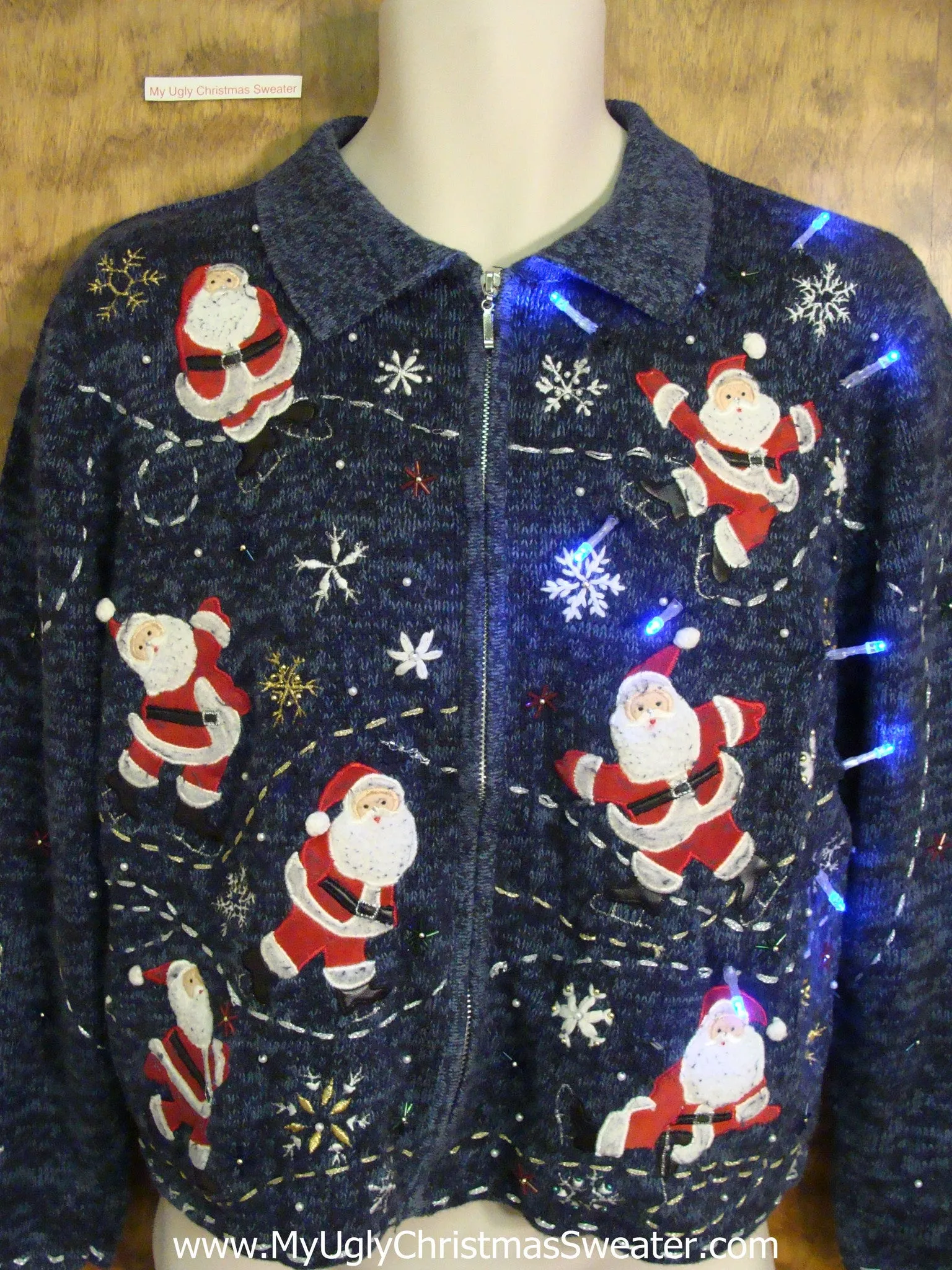 Seven Skating Santas Light Up Ugly Xmas Sweater