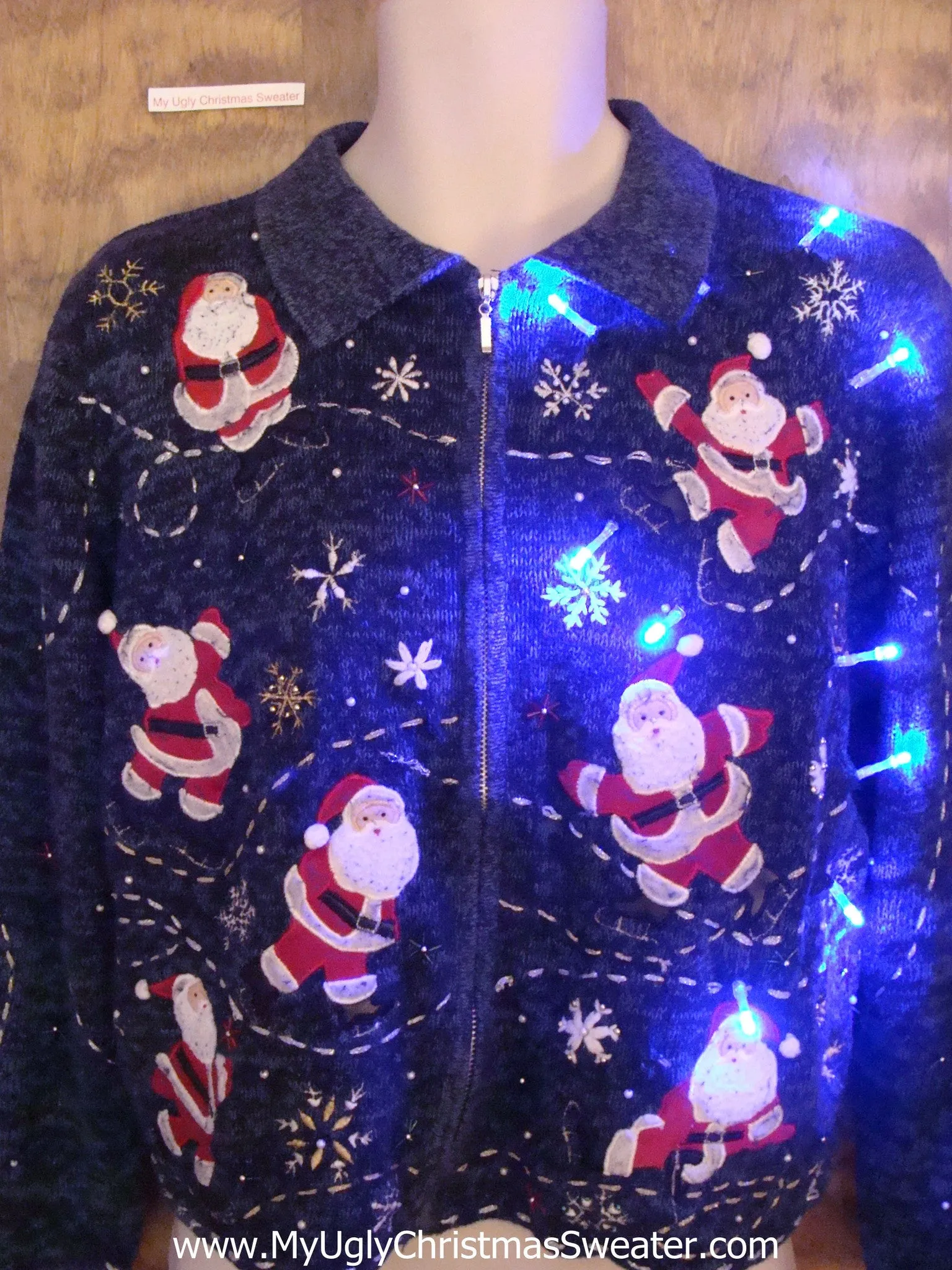 Seven Skating Santas Light Up Ugly Xmas Sweater