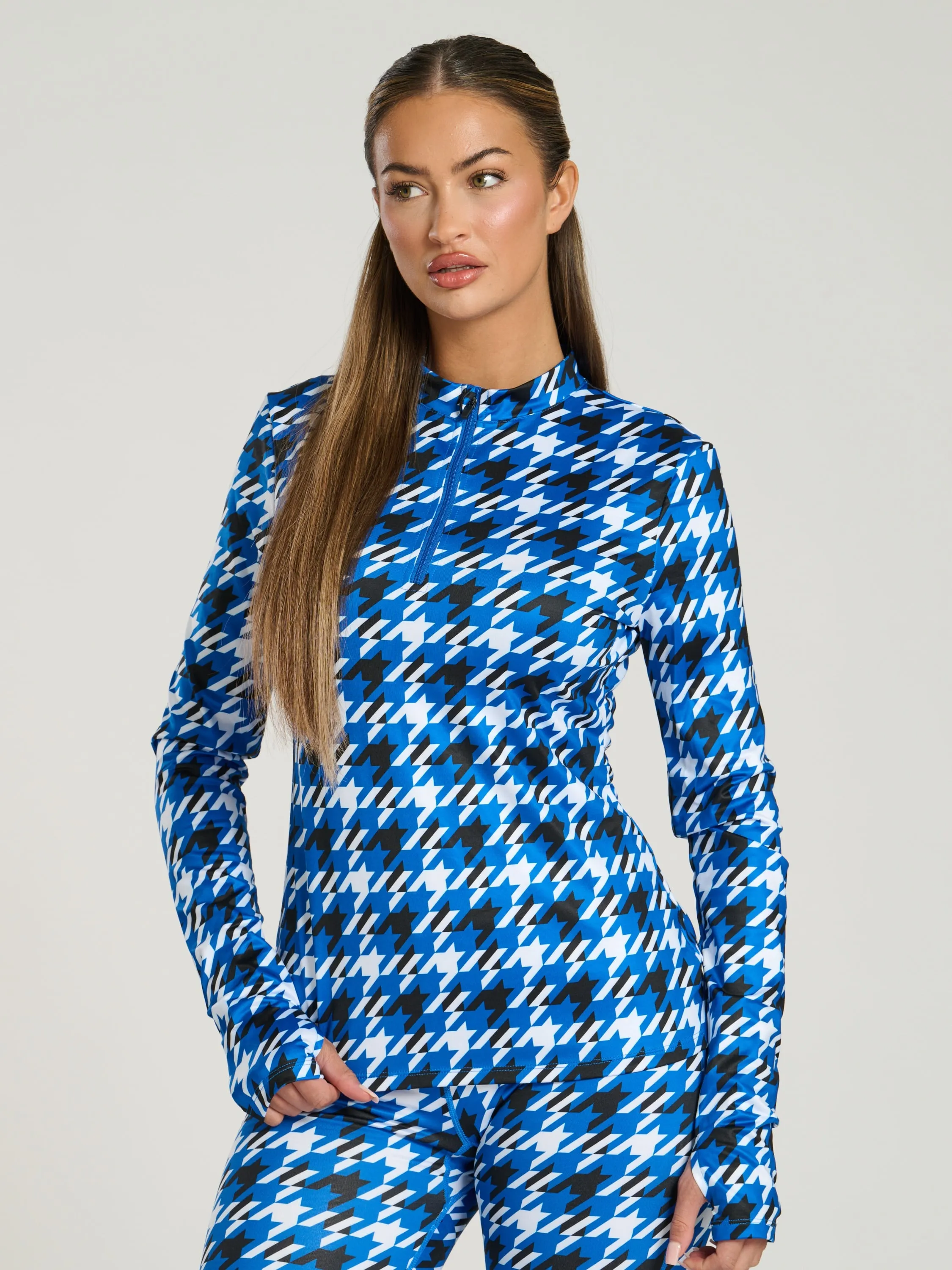 The 'Alps' half zip base layer in cobalt houndstoothThe