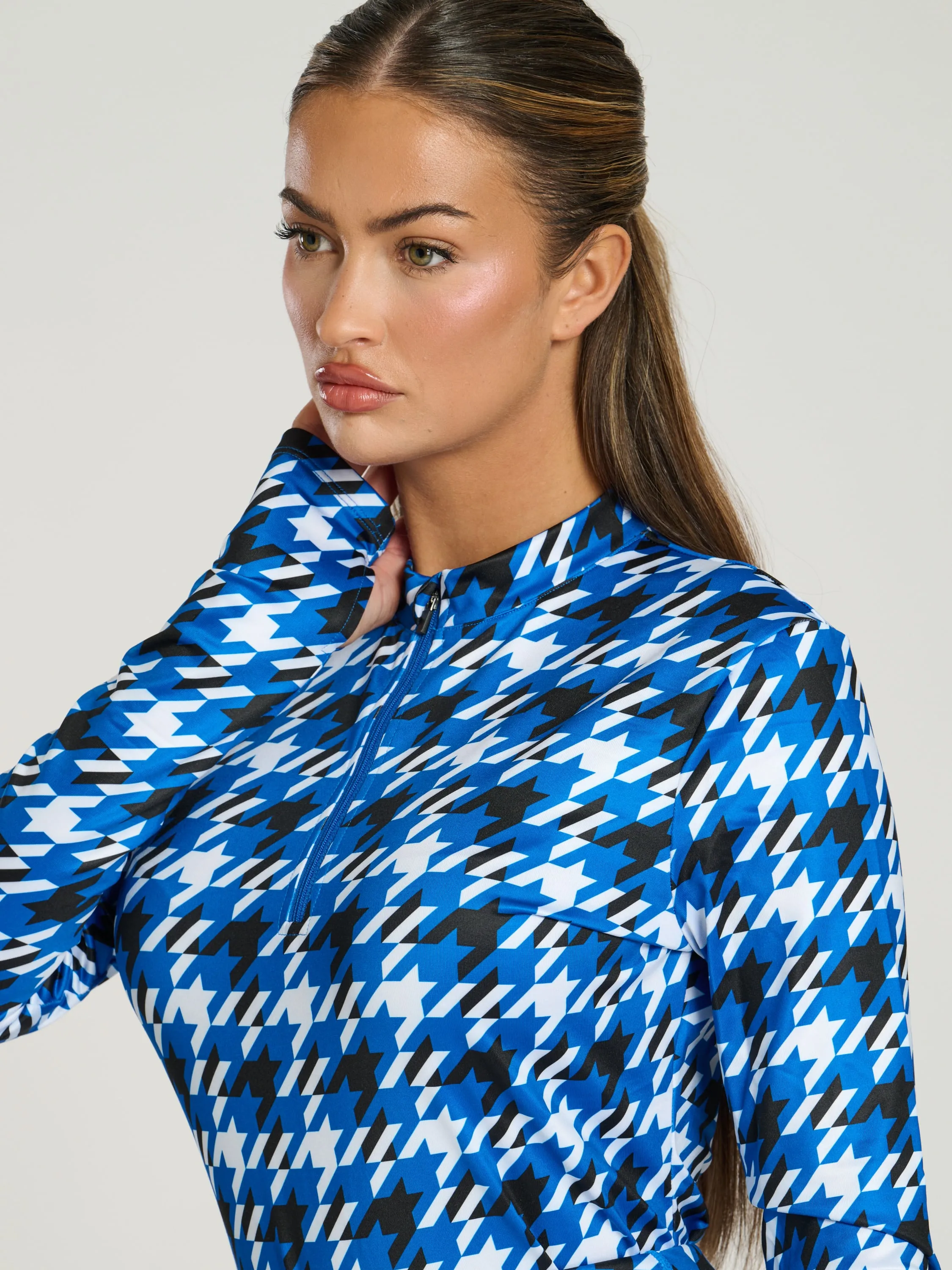 The 'Alps' half zip base layer in cobalt houndstoothThe