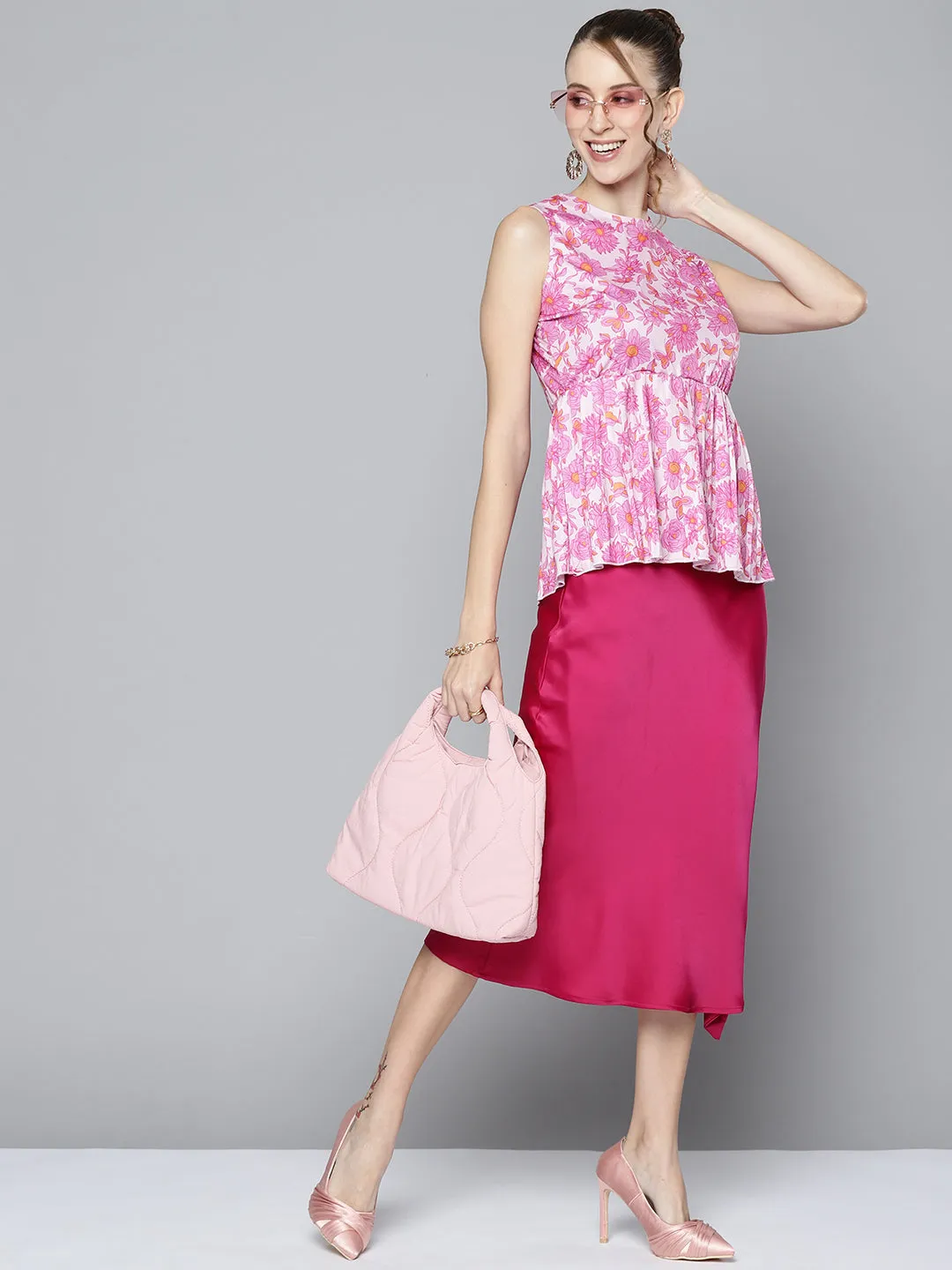 Women Pink Floral Sleeveless Knit Peplum Top